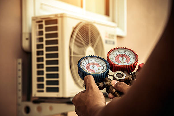 Professional Hvac Repair technician working in Van Buren, AR
